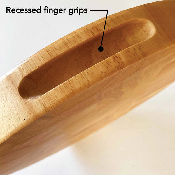 recessed finger grips on charcuterie board